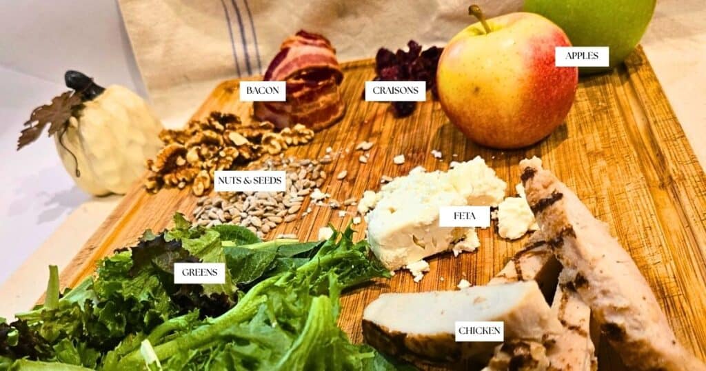 ingredients for fall harvest salad on cutting board