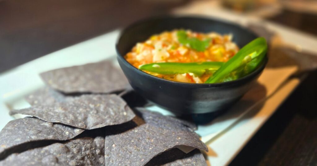 THIS IS AN IMAGE OF CONCH CEVICHE AT CAPS ON THE WATER